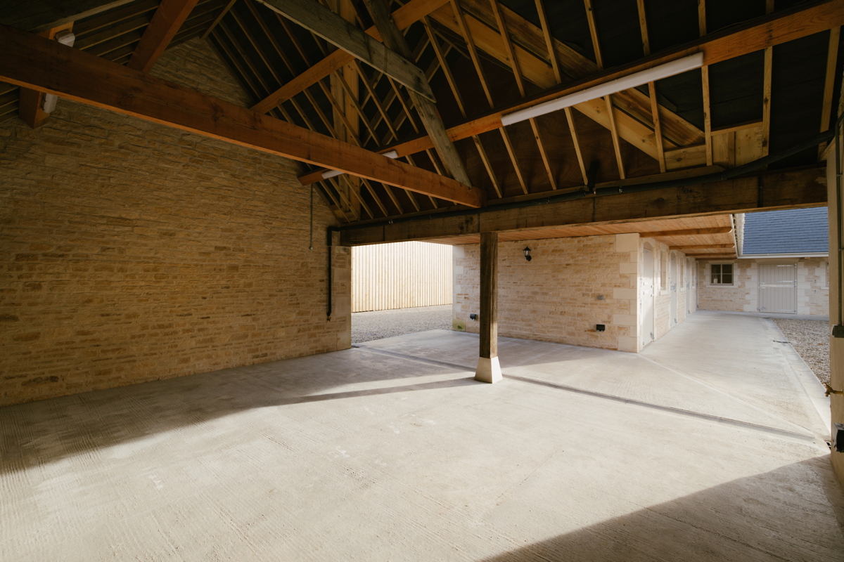 Interior of renovated barn showing exposed beams