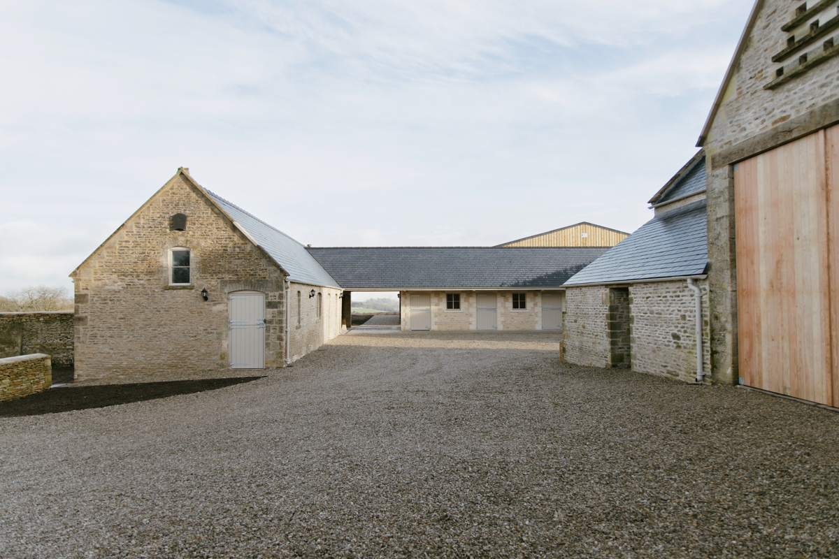 Exterior view showing new roofing and preservation of original architectural features