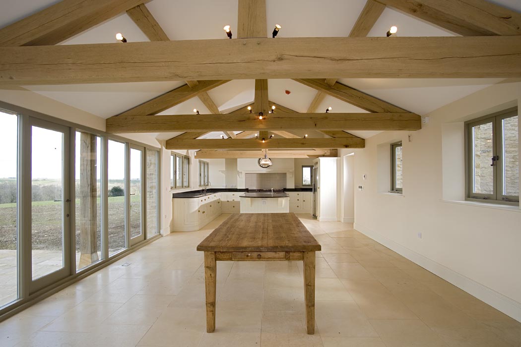 Refurbished interior kitchen showing traditional wooden beams