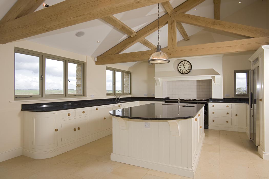 Refurbished interior kitchen design with exposed beams
