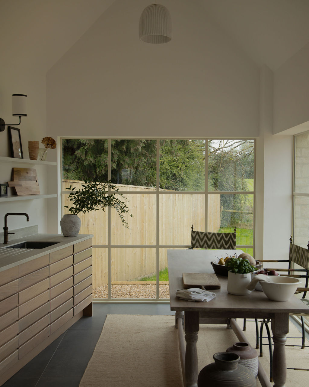 Interior view of the kitchen area, looking towards window to garden