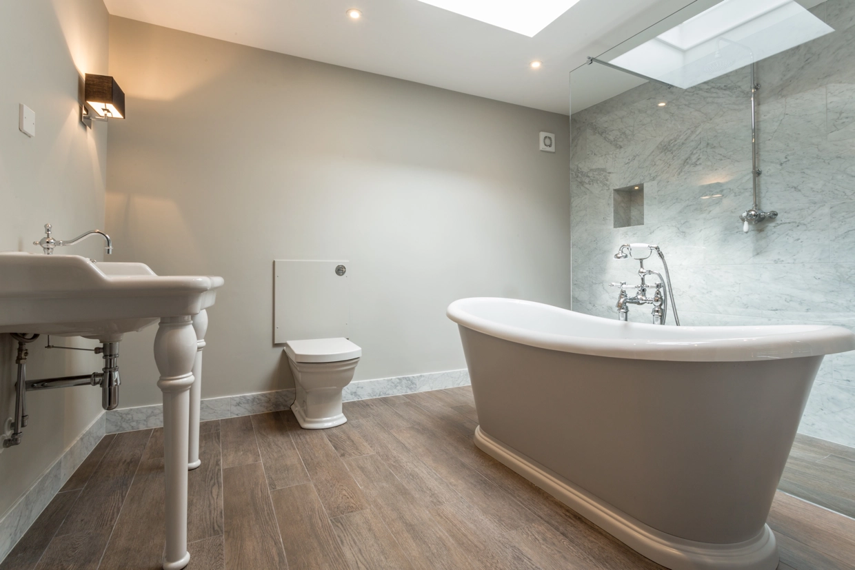 Interior view of renovated bathroom with sky light