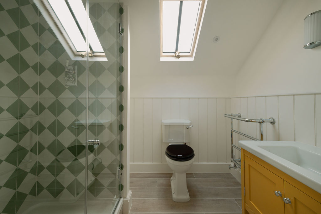 Renovated bathroom featuring modern amenities