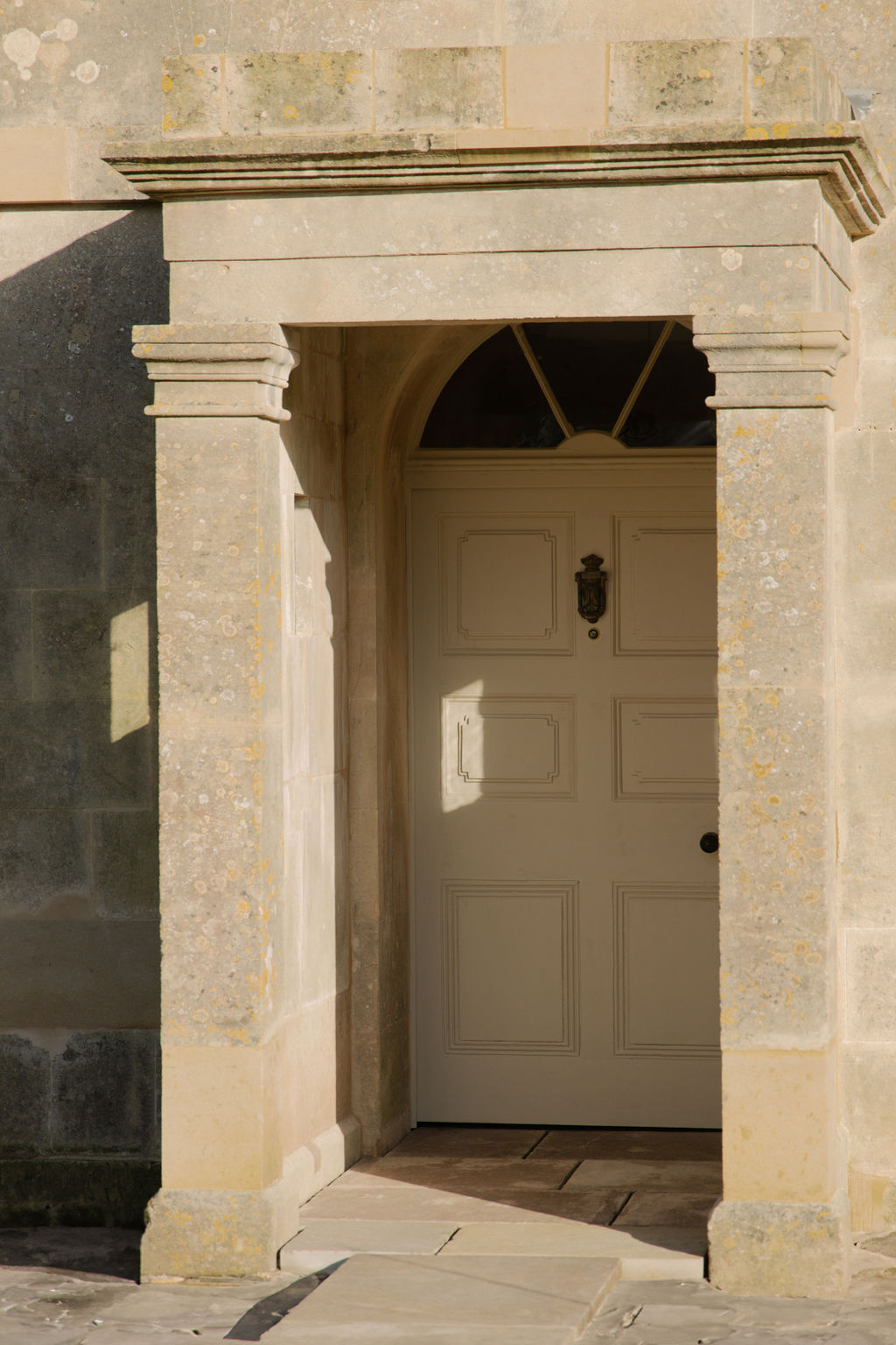 Manor House exterior view showing traditional stone doorway