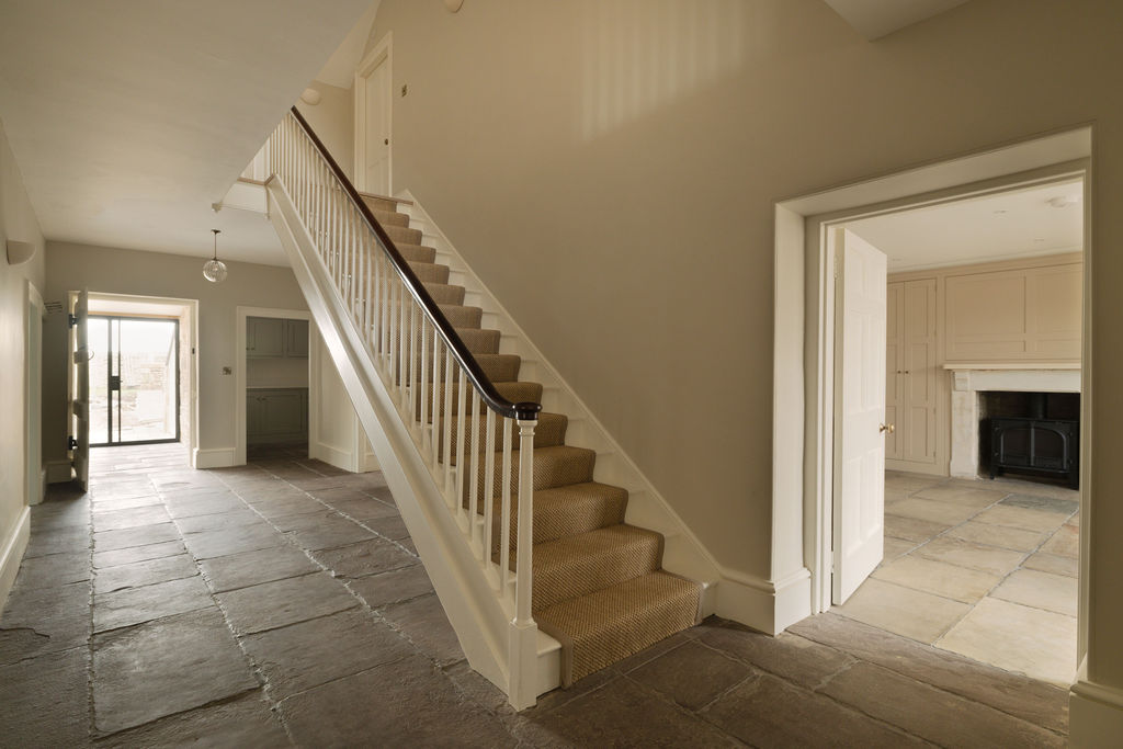 Interior hallway showing York stone flooring and staircase
