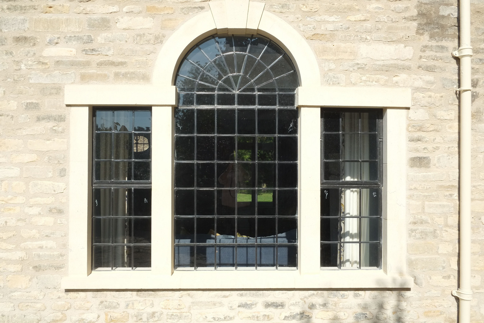 Exterior renovated traditional leaded window feature