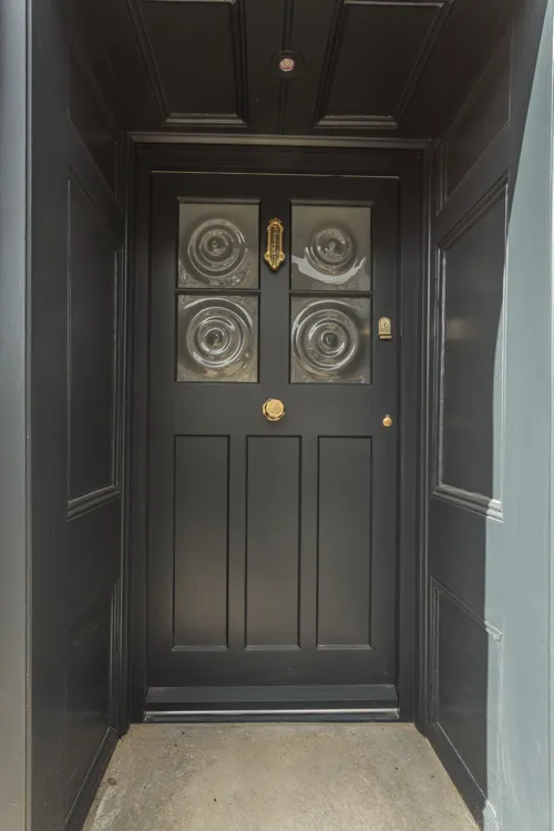 Exterior view of the front door with period features